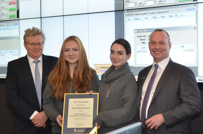 Romana Cernakova and Katerina Lachilova, first-place winners, with Professor Tom McCurdy, Director of the Finance Lab, and Jeff Trapp, Associate Director of Rotman Commerce Recruitment and Admissions