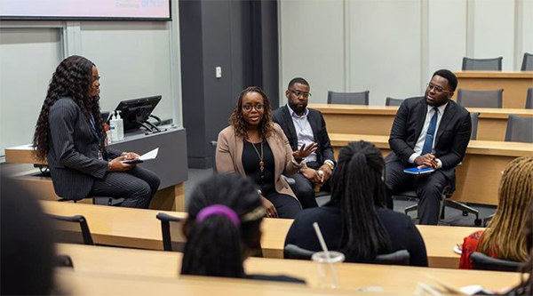 Black students and professionals discussing at the 2023 Black Career Conference